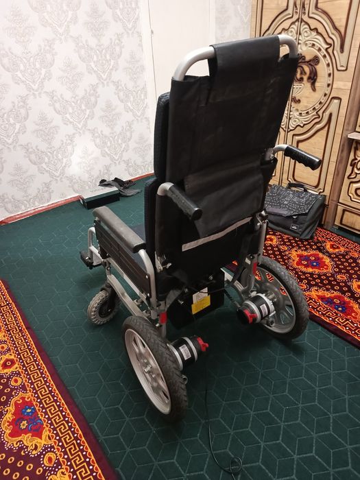 Электронная коляска для инвалидов