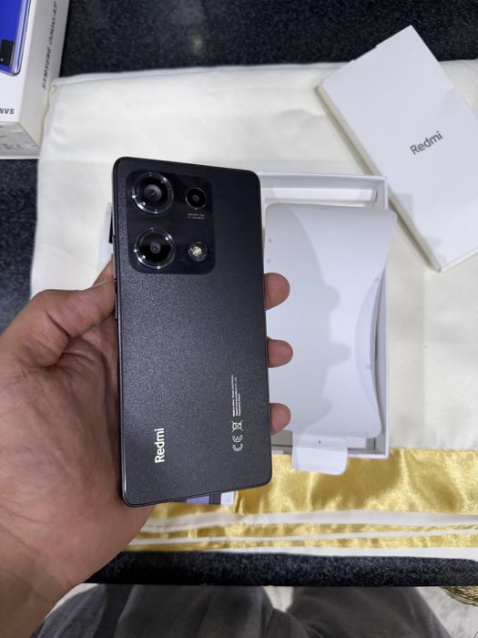 redmi not 14s pamit 8.256g holati ideal karopka dak bor