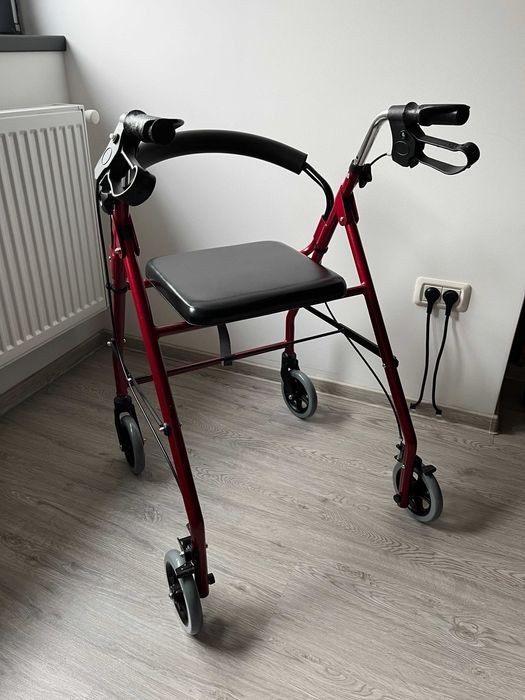 Cadru mergator pliabil cu 4 roti, scaun odihna, frane auto-blocante