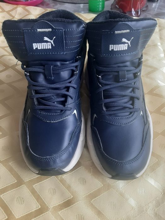 Продавам зимни топли маратонки РUMA номер 41 стелка 26.5  малко носени