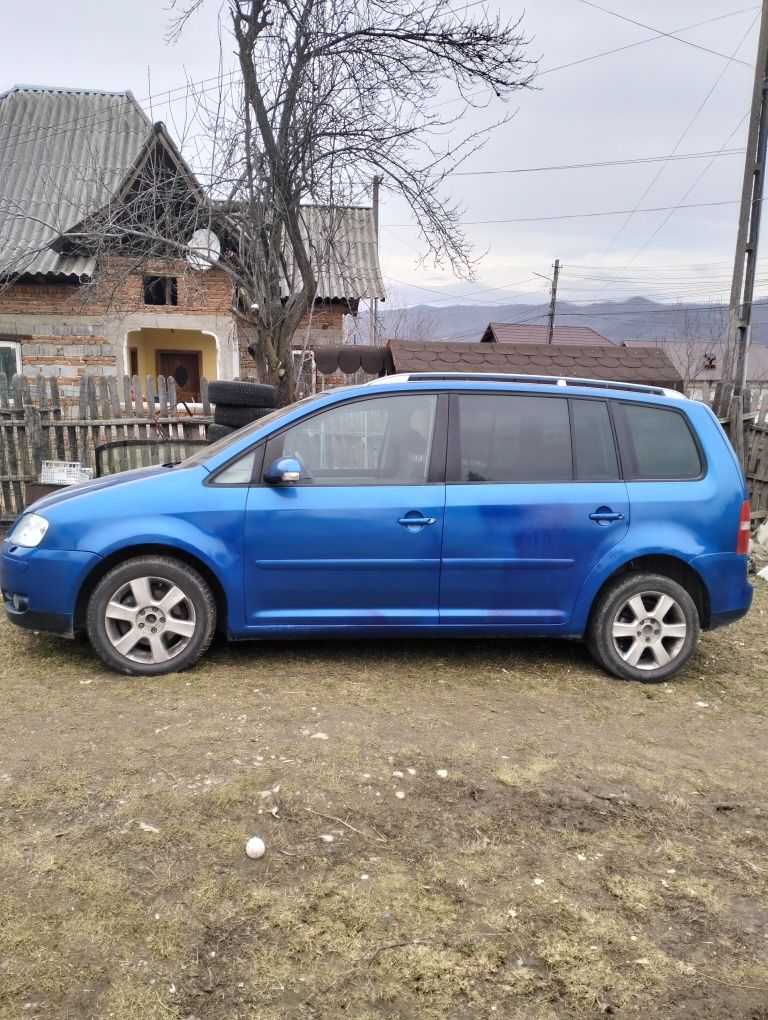 Volkswagen Touran sau schimb cu ATV