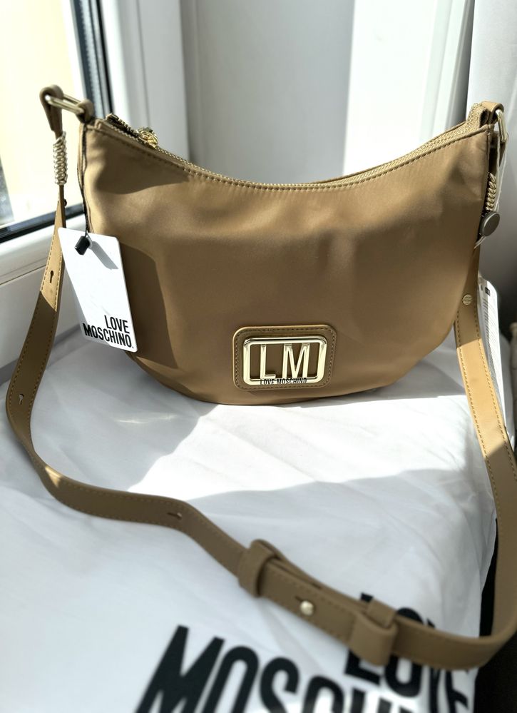 Женская сумка известного бренда. Оригинал