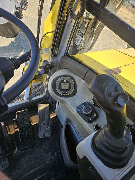 Excavator pe roti Neuson rototilt