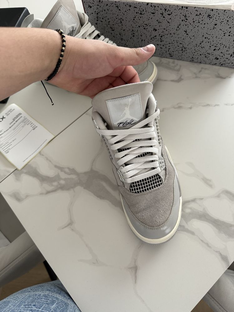 Jordan 4 Frozen Moments