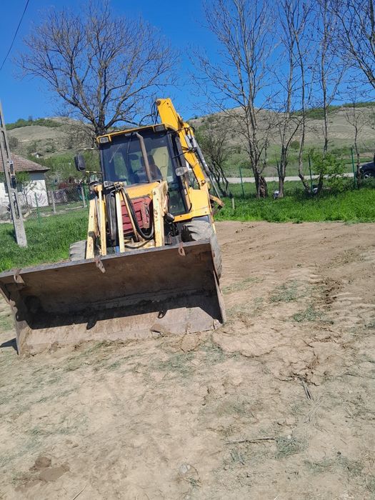 Dezmembrez buldoexcavator terex fermec mf 860
