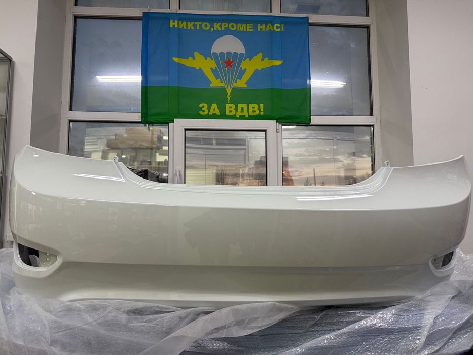 Задний бампер белого цвета Hyindai Solaris