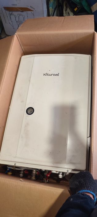 Продам газовый котел Kiturami