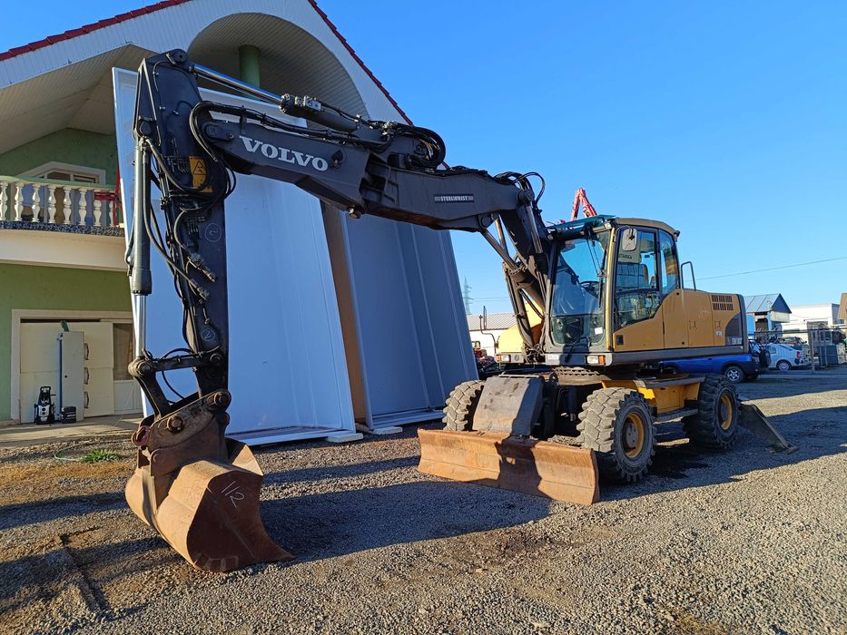 Excavator pe roti cu lama si cale , Volvo EW 180C , 20 tone , 2011