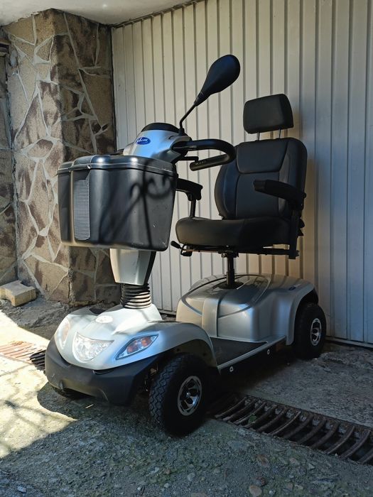 Carucior scuter electric scaun dizabilitati  carut tricieleta handicap