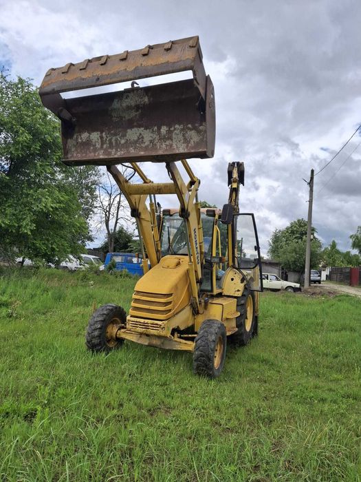 Buldoexcavator Komatsu