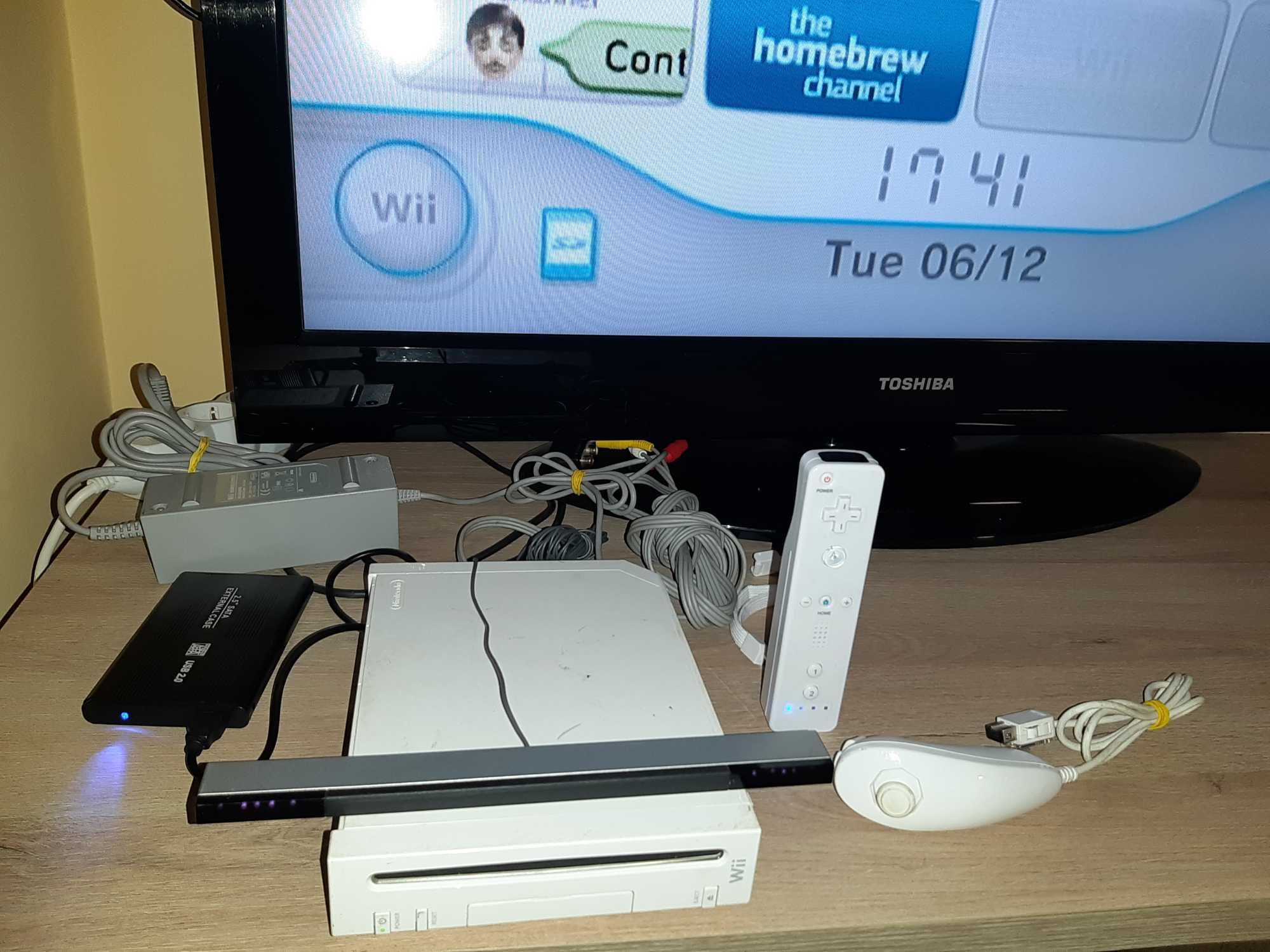 Нинтендо Nintendo Wii комплект цената е за всичко 89 игри на хард диск