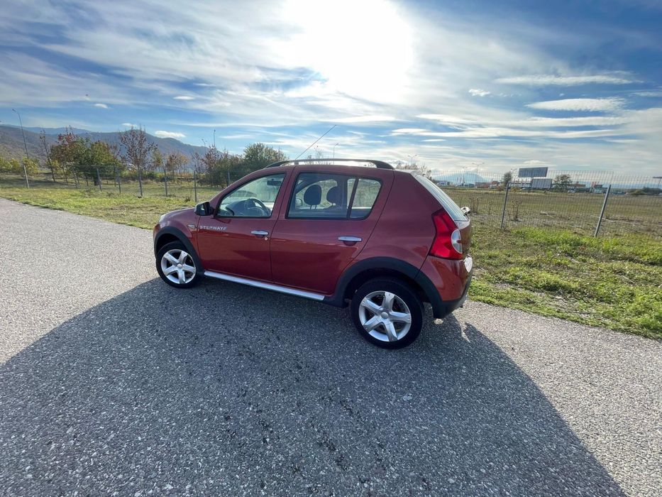 Dacia Sandero 1.6 benzină 2011 Ac 212000 km rosie cutie manuala 84 cp