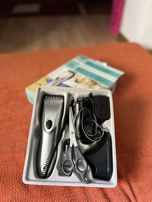 Masina de tuns ca noua