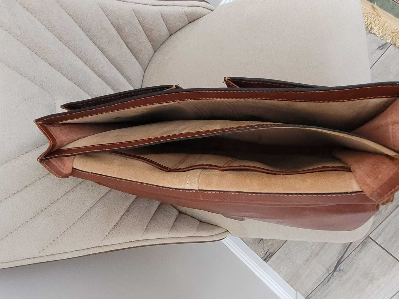 Продам кожаный портфель.