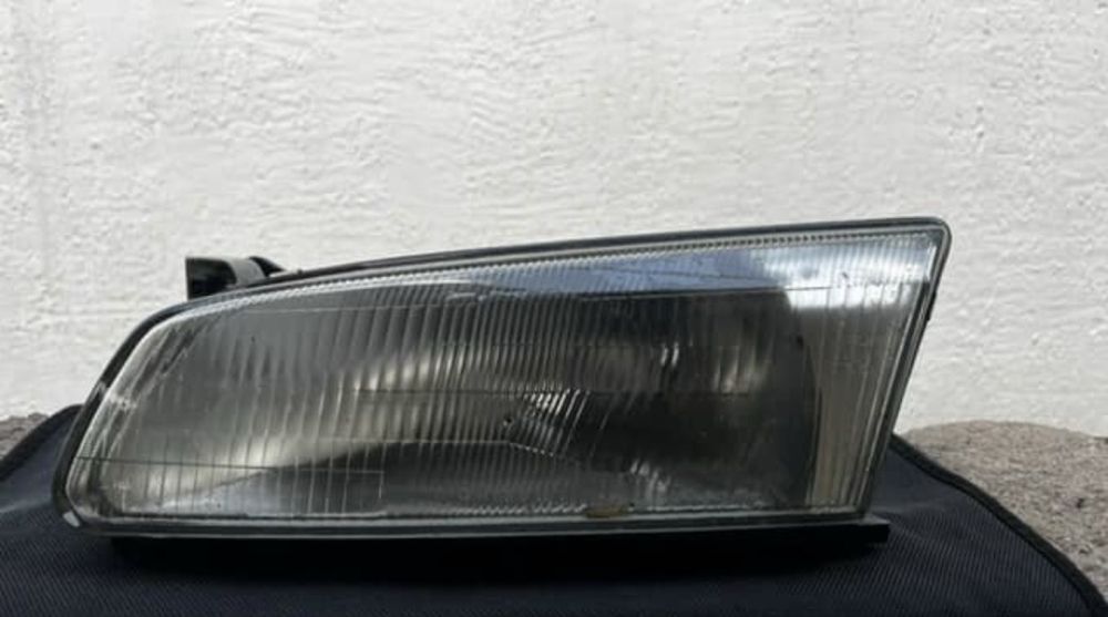 Левая фара тайота камри 20