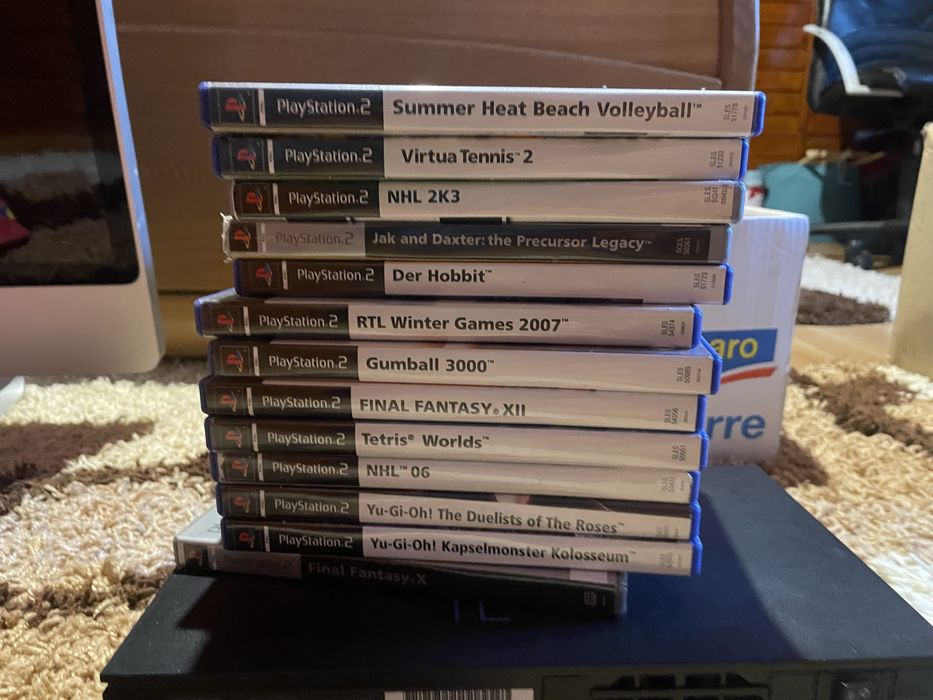 Vand consola ps 2 cu mai multe jocuri