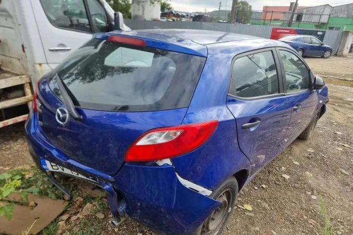 Interior complet tapiterie  scaun sofer stanga dreapta bancheta spate fata plansa ceasuri bord  timonerie Mazda 2 DE 2008 motor 1.3benzina 75cp cod motor ZJ