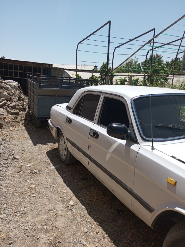 Volga 3110 aravasi bilan holati rasmda