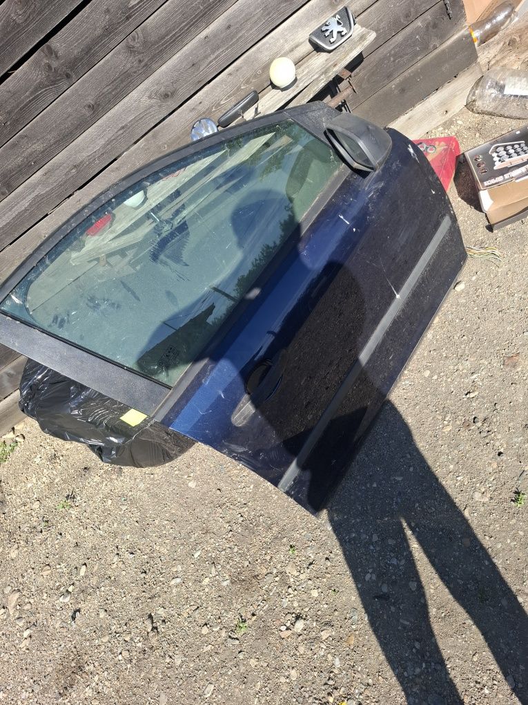 Vand usa drepta fata am și spate ford focus 2 an 2007 broasca geam