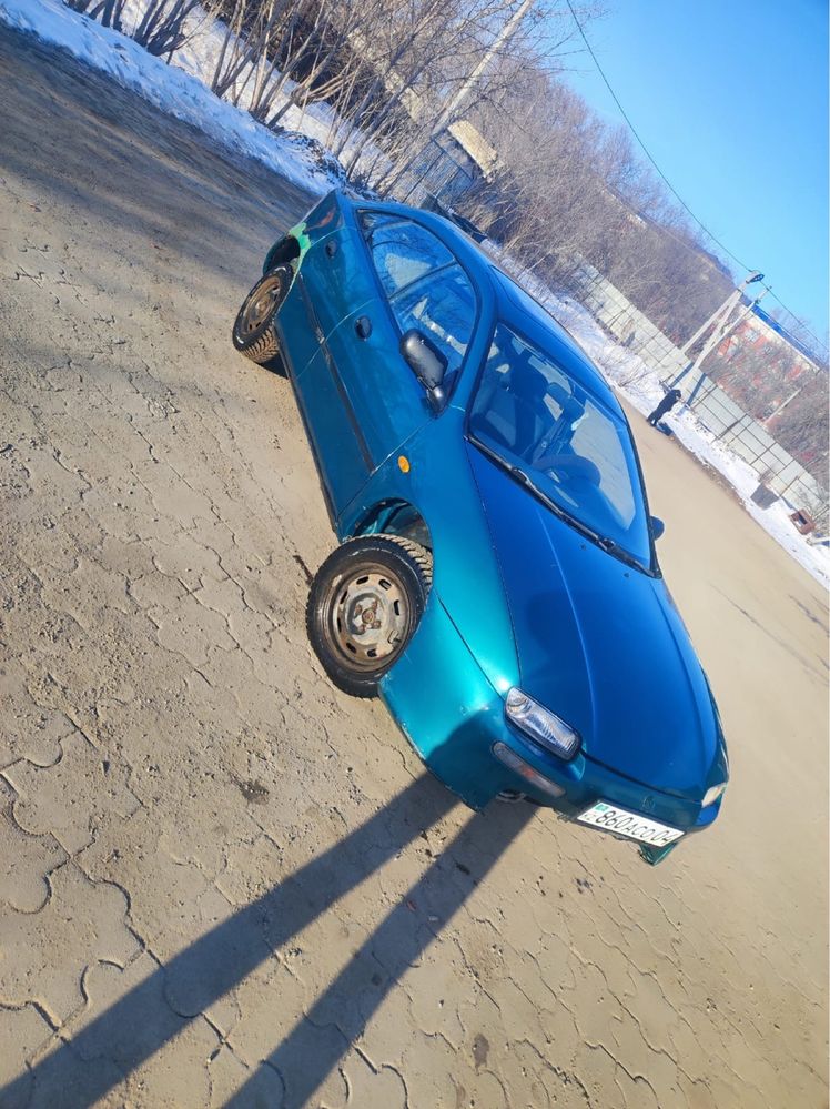 Мазда mazda 323f BA