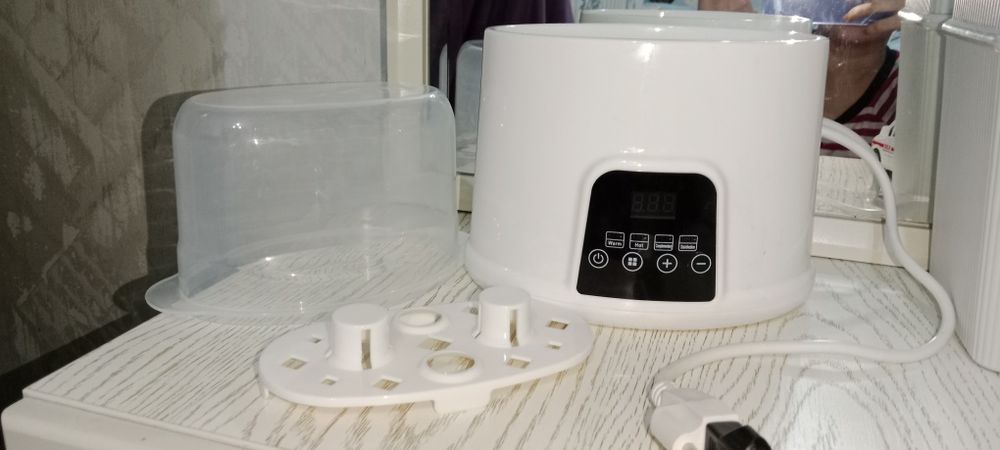 Chaqaloqlarning ovqat va sut isitgichi bug sterilizatori