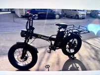 E-bike. Leopard. Велосипед с электромотором и батареей