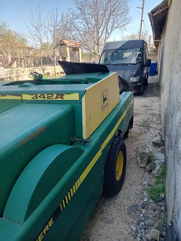 балировачка John Deere