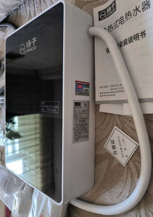 Водонагреватель проточный электрический 7000 Вт