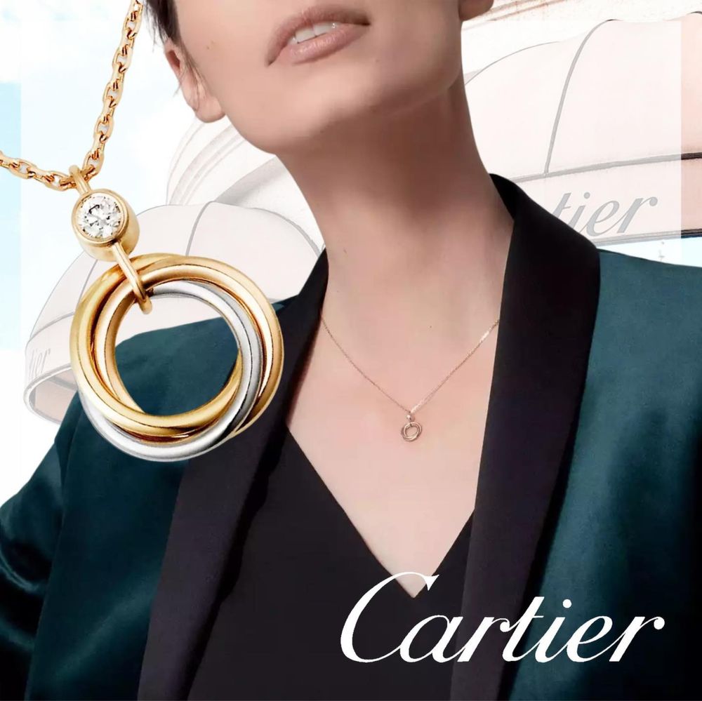 Позлатени пръстени и колиета Trinity de Cartier 750 / 18k