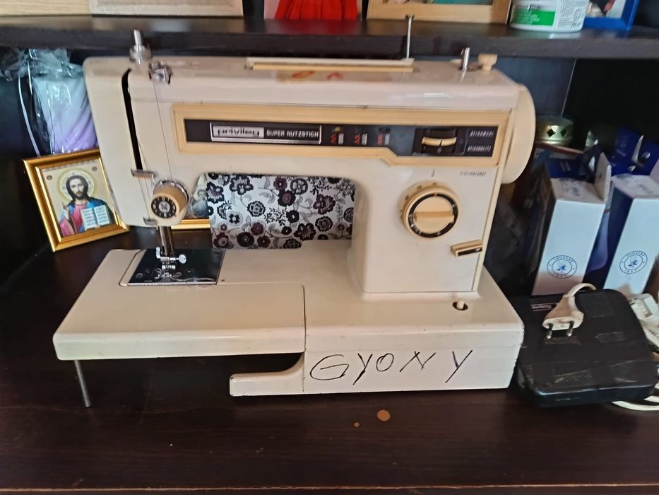 Reparații mașini de cusut casnice sau industriale