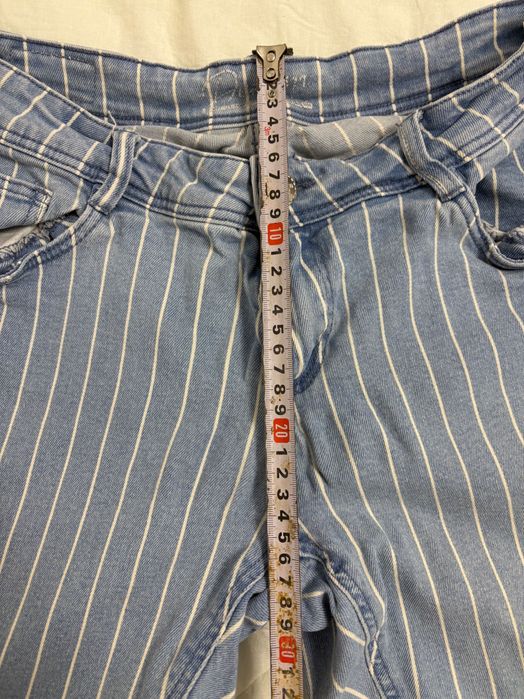 Blugi elastici de dama cu dungi