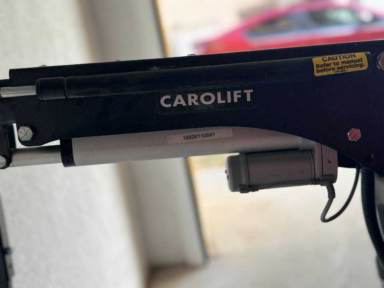 Подемник за мобилни устройства в багажника Autoadapt Carolift 6900