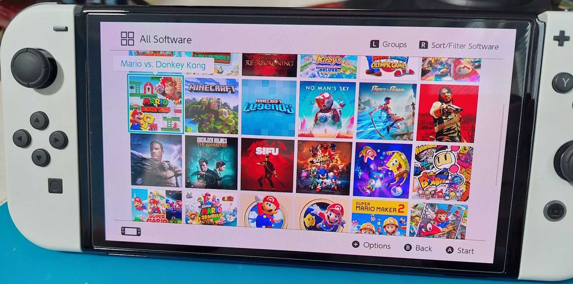 Конзола Nintendo Switch OLED, 512 gb sd card инсталирани над 40 игри
