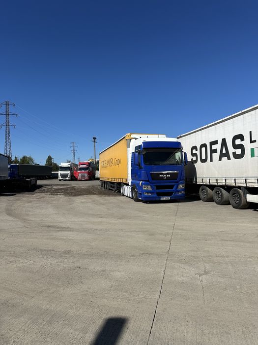 MAN TGX 440 mega an fabricatie 2009 euro 4 ,remorca schmitz mega 2008