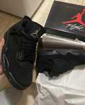 Jordan 4 black cat
