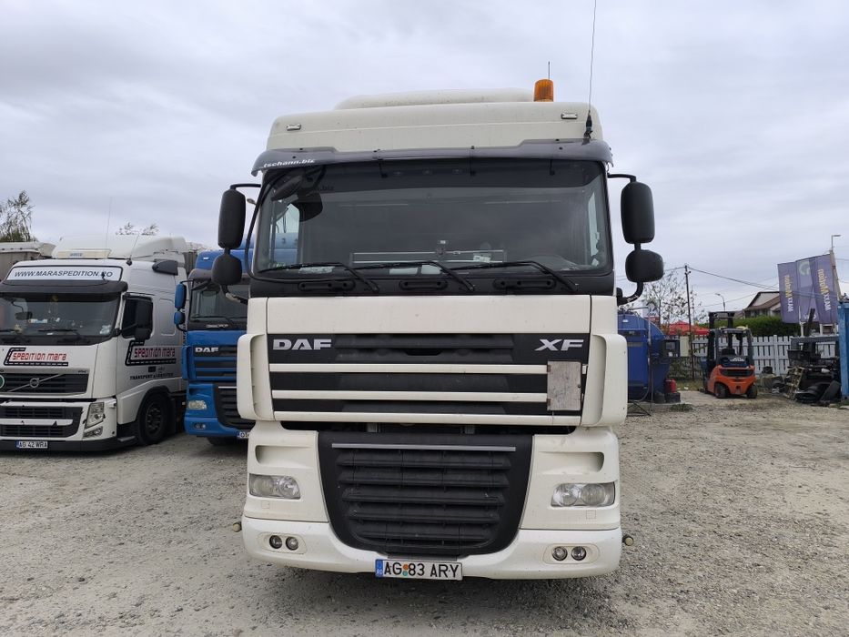 Ansamblu DAF XF 105 cutie automata an fabricație 2012 semiremorca Schm