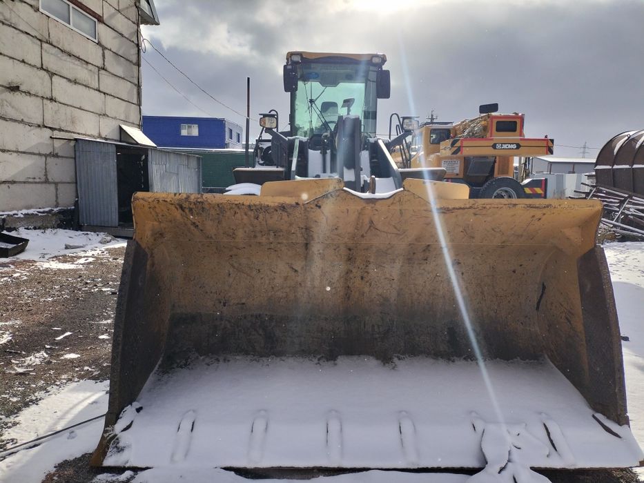 Фронтальный погрузчик продажа.