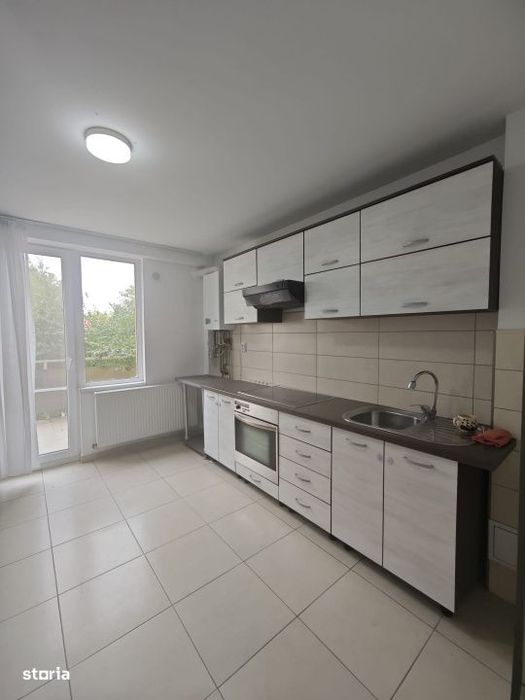 Apartament spatios 2 camere, etaj 1, terasa generoasa si balcon, curte
