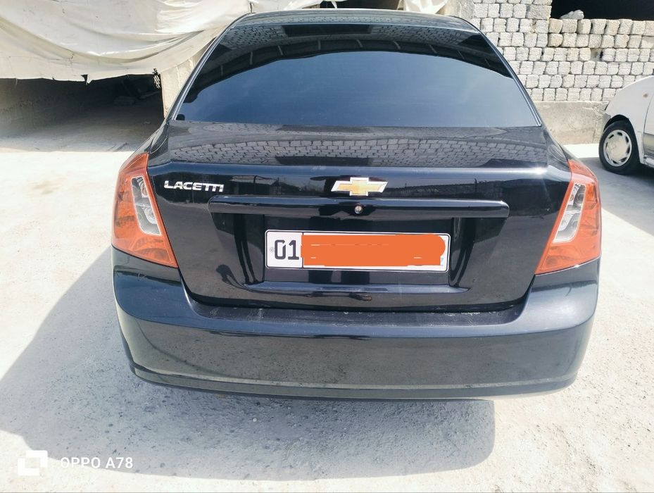 Lasetti Gentra Qora kraska top toza