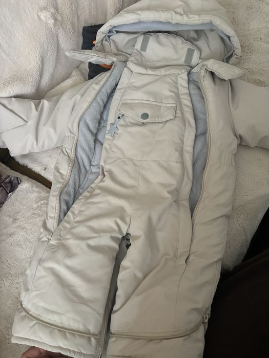 Продам детский комбинезон зимний lassye