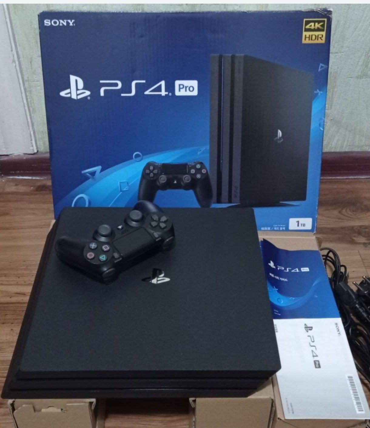 PS4 PRO 1 TB янги холатда 19 уйини билан