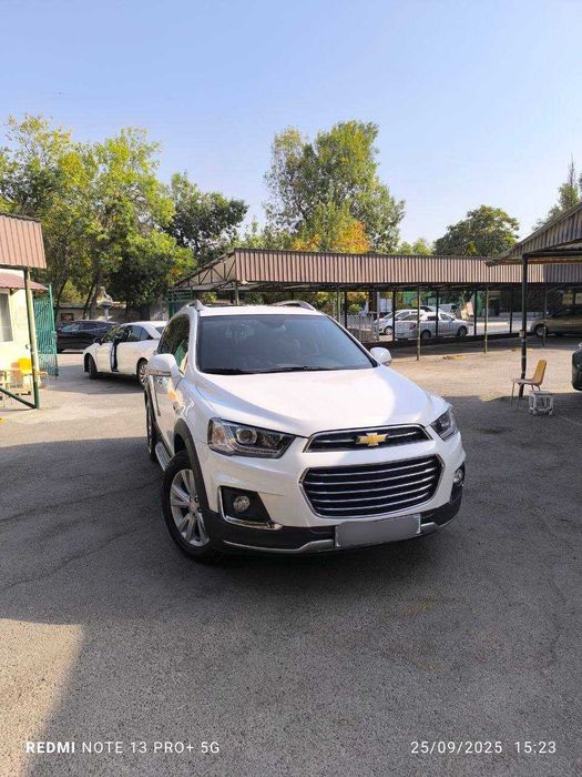 Chevrolet Captiva 3/4 — белый жемчуг
