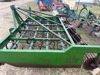 Cultivator purtat în tirant