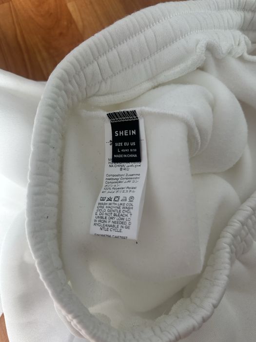 Pantaloni evazati albi