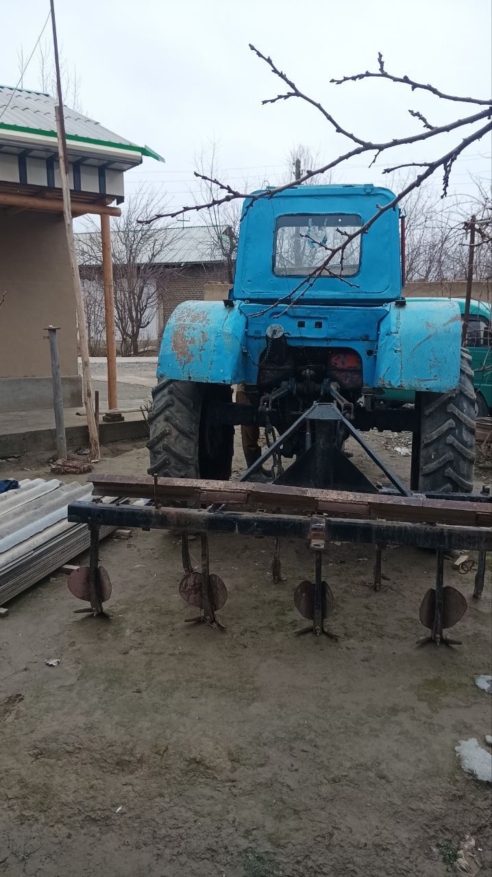 МТЗ 80 трактори прицеп ва чизели билан сотилади