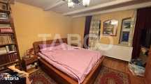 Casa de vanzare Cornatel curte spatioasa loc de relaxare si gradina