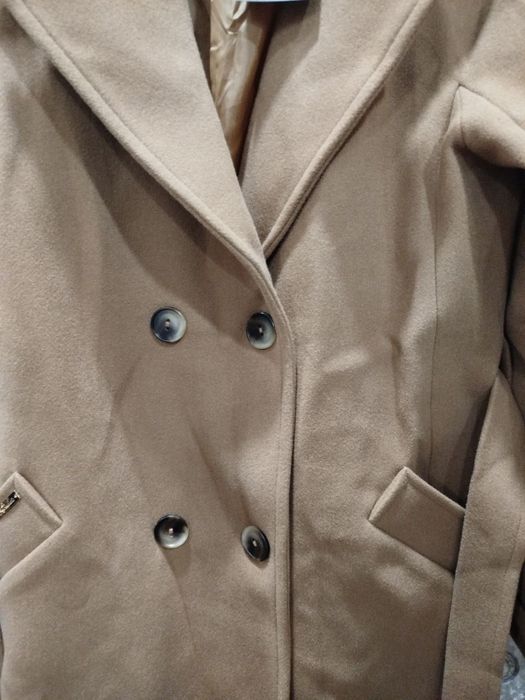 Женское польто……..