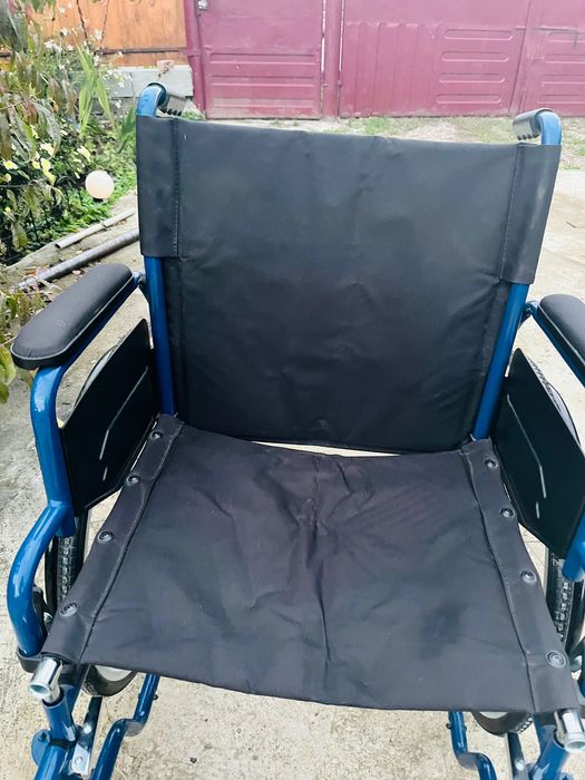 Scaun cu rotile in stare buna