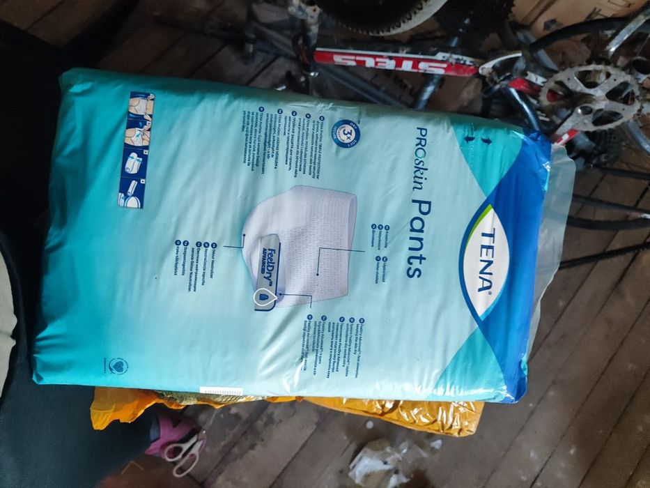 Tena подгузники-трусы  для взрослых