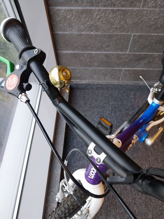 Vând bicicleta Woom 2 + casca woom XS